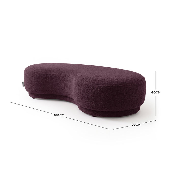 Plum kidney-bean shaped upholstered bench seat with dimension markers on a white background