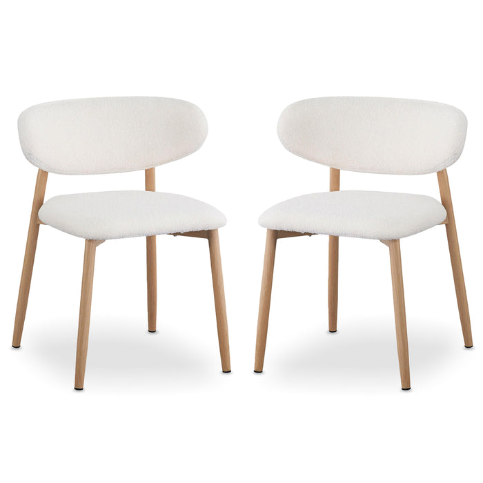 Audrey Curved Fabric Dining Chair Set of 2 in Cream White features rounded backrests, white bouclé upholstery, and tapered light-wood legs, suitable for contemporary or Scandinavian-inspired interiors.