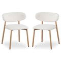 Audrey Curved Fabric Dining Chair Set of 2 in Cream White features rounded backrests, white bouclé upholstery, and tapered light-wood legs, suitable for contemporary or Scandinavian-inspired interiors.