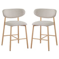 Audrey Curved Dining Chair & Bar Stool Bundle features light-wood legs and elegantly curved light-beige upholstered seats and backs, offering a luxurious and sophisticated design for premium interior spaces.