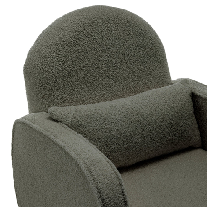 Close-up of the Aura Boucle Rocking Chair with Ottoman in Green, showcasing its modern design with boucle-style fabric, rounded backrest, arm, seat cushion, and matching lumbar pillow.