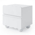 White modern nightstand with wavy drawer fronts on white background