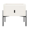 Eliz Boucle Fabric Bedside Table in Cream White, featuring a cuboid shape with boucle upholstery, a centered drawer with black pull, and sleek black metal legs, embodying contemporary elegance.