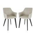 Ella Linen Dining Chair Set of 2 in Cream White, featuring gently curved, upholstered seats with integrated low armrests, and four tapered black legs, showcasing a modern dining-style design.