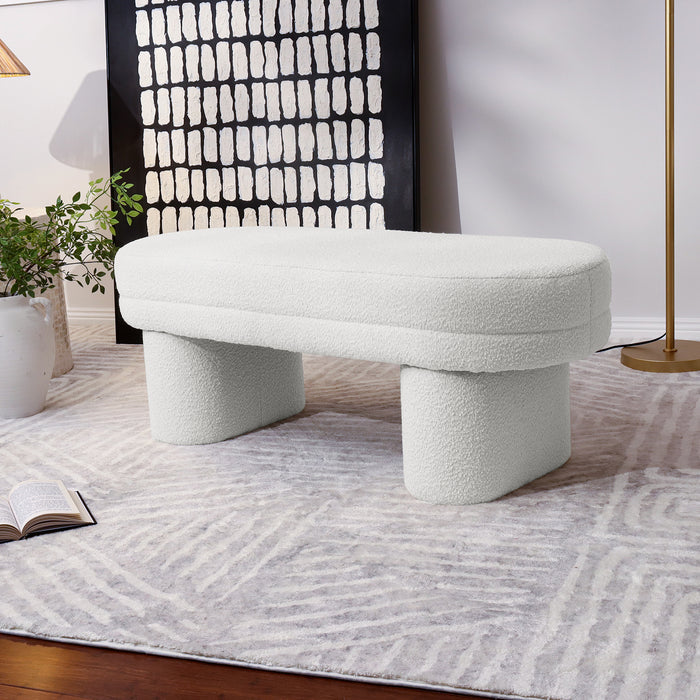Close-up of the Elzan Bouclé Upholstered Bench in Eggshell White, showcasing its curved, plush bouclé texture and modern design, emphasizing its elegant and versatile addition to contemporary interiors.