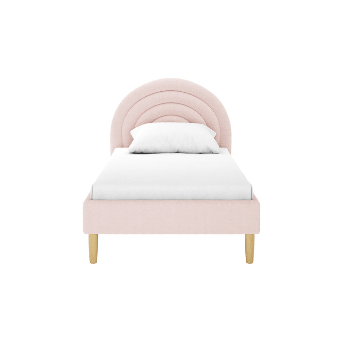 Estilla Single Rainbow Boucle Bed Frame features a rounded headboard with three arches, upholstered in boucle fabric, mounted on tapered wood legs, and dressed in a plain white sheet and pillow.