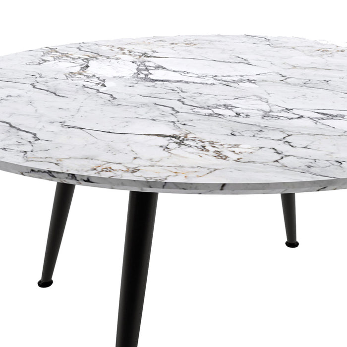Eugene 120cm 4 Seater Round Dining Table in Marble, featuring a white marble-veined tabletop with sleek black metal legs, embodies modern elegance and functionality in any dining space.