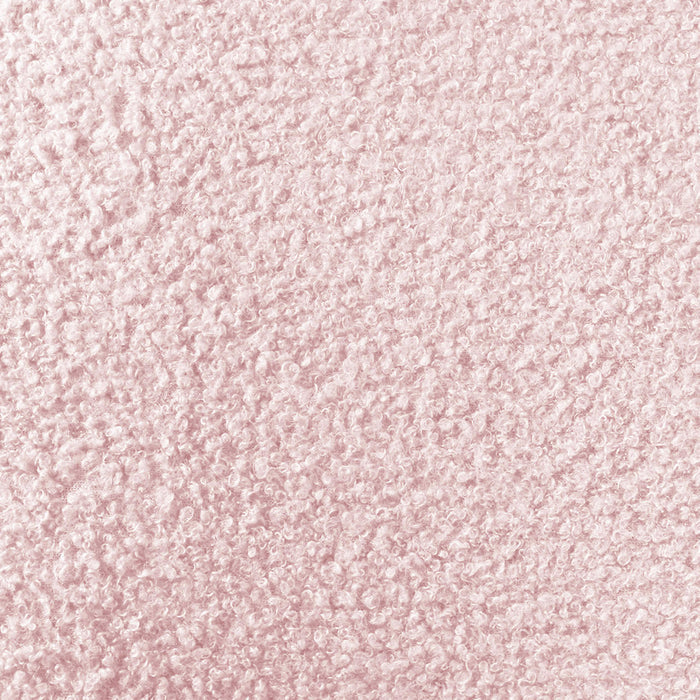 Close-up of the Fausta King Single Arched Bouclé Bed Frame, showcasing its luxuriously textured, looped fabric surface in light pink, emphasizing the plush, nubby feel of the bouclé material.