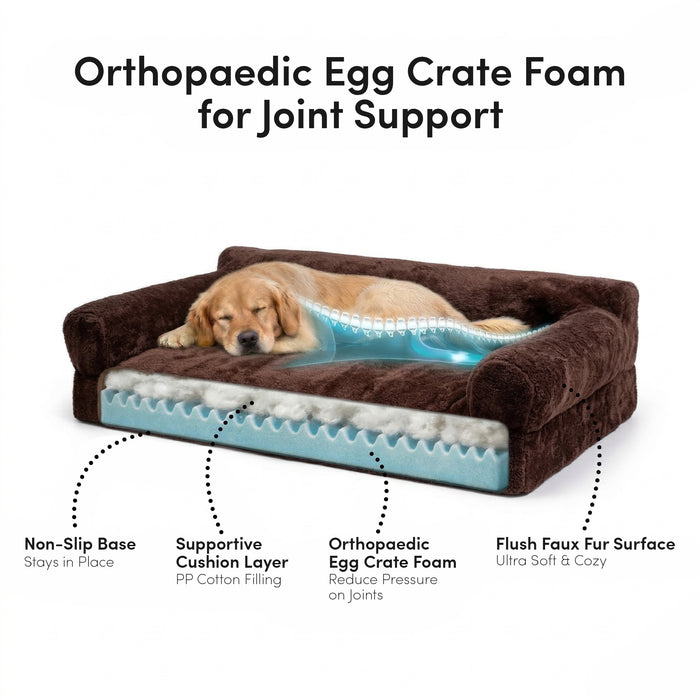 Orthopaedic brown faux fur dog bed with egg crate foam layer and non-slip base, dog resting on top