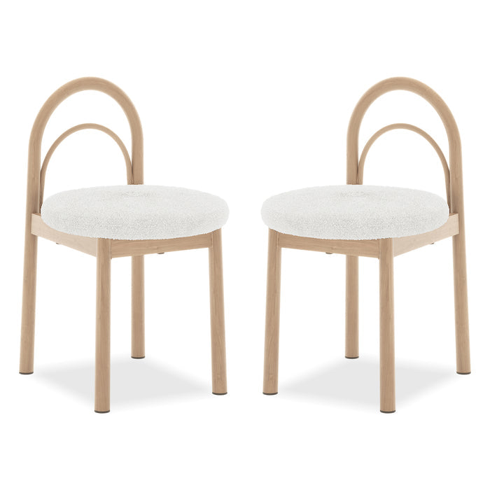 Gilles Boucle Arched Dining Chair Cream White Set of 2, featuring a sleek double-arched backrest and white cushions, showcases its elegant design with durable metal frames, perfect for dining spaces.