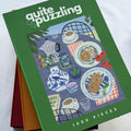 The "Half-Sour Sundays" 1,000 piece puzzle by Quite Puzzling features a New York breakfast scene on a blue checkered table—an ideal coffee table challenge for puzzle lovers.