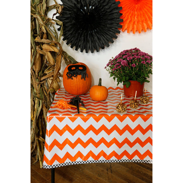 freckled sage chevron orange oilcloth tablecloth with black gingham trim decorated for halloween