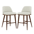 Jeremi High Back Linen Bar Stool Set of 2 in Wheat Walnut features cream upholstered seats, low backs, and dark-wood frames with tapered legs, embodying mid-century modern elegance for your kitchen or bar.