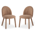 Joren Boucle Arched Dining Chair Set of 2 features oval backrests with vertical pleating, round cushioned seats, and cylindrical legs, all upholstered in textured speckled-bouclé fabric, offering supportive comfort.
