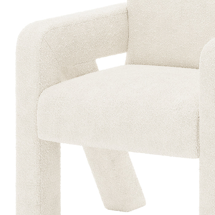 Julie Boucle Upholstered Accent Chair Cream White, featuring soft boucle fabric with thick sponge padding, showcases a modern design. The chair's engineered wood structure provides stability, perfect for various room settings.