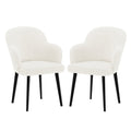 Lennon Bouclé Dining Chair Set of 2 in Cream White, featuring softly curved backrests, integrated armrests in textured bouclé fabric, and supported by slim black legs, offers modern elegance and comfort.