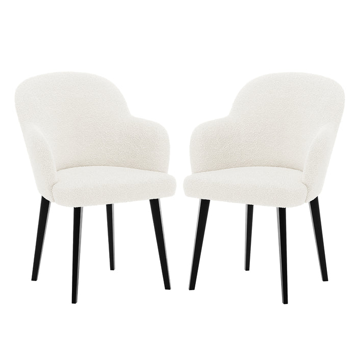Lennon Bouclé Dining Chair Set of 2 in Cream White, featuring softly curved backrests, integrated armrests in textured bouclé fabric, and supported by slim black legs, offers modern elegance and comfort.