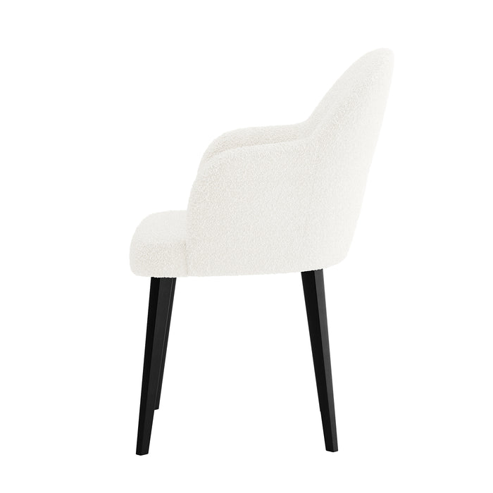 Lennon Bouclé Dining Chair Set of 2 in Cream White features modern upholstered chairs with curved backs, integrated armrests, and black tapered legs, offering elegant style and plush comfort for any dining space.