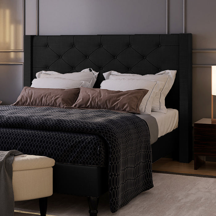 Maggie Queen Winged Fabric Bed Frame – Black, featuring a plush, deep-buttoned Chesterfield headboard. The bed's sophisticated design showcases premium black upholstery and solid construction, emphasizing luxury and durability.