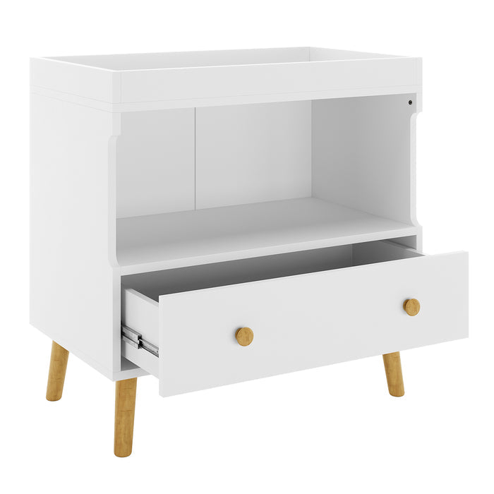 Mariella Solid Pine Baby Change Table with Storage Drawer & Shelf – White features a white dresser with a wooden handle and a sturdy, modern design, ideal for organized, efficient nursery care.