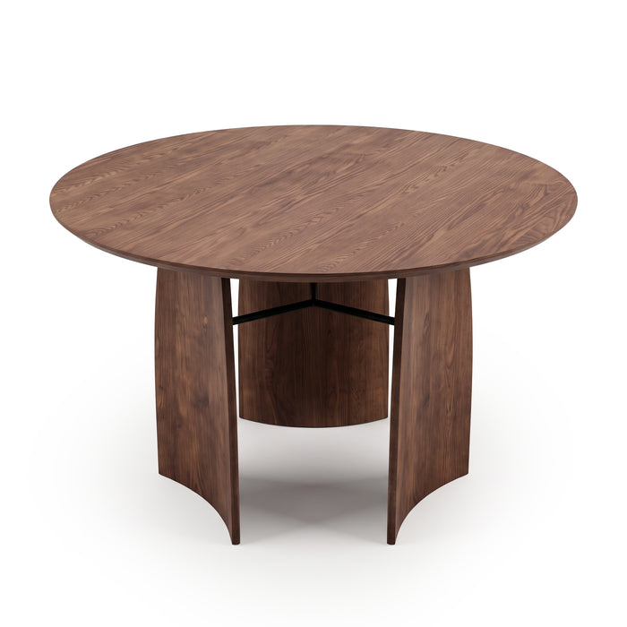 Round wooden table on a white background with curved panel legs