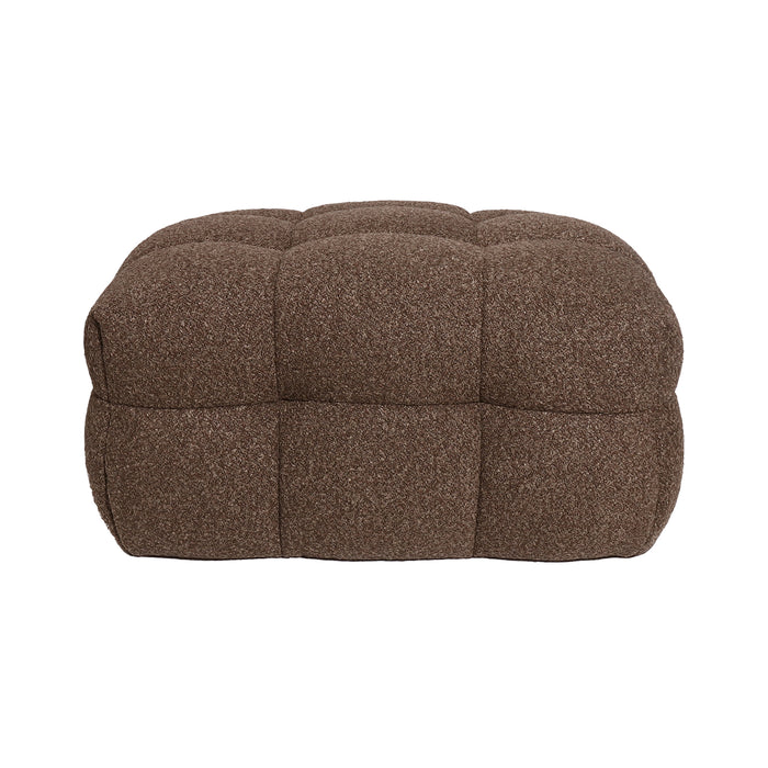 Norah Boucle Ottoman in Brown featuring a low, rectangular design with a plush, tufted surface in nubby fabric, perfect for versatile use as seating or a footrest.