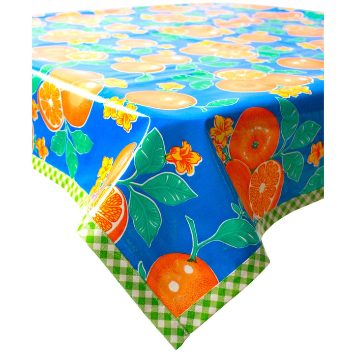 freckled sage oranges blue oilcloth tablecloth with lime green gingham trim