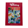 The Quite Puzzling "Radish in the Joy" 500-piece jigsaw puzzle comes in a book-style box with a red border, showing an illustrated dining table scene—an ideal coffee table puzzle.