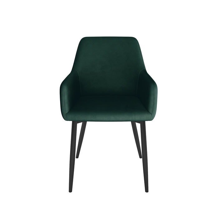 Raynie Velvet Dining Chair Set of 2 in Deep Green featuring a softly curved upholstered shell, integrated low armrests, and four slender splayed black metal legs, exuding modern elegance and comfort.