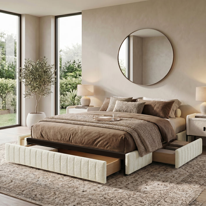 Upholstered storage bed in a decorated bedroom setting with open drawers