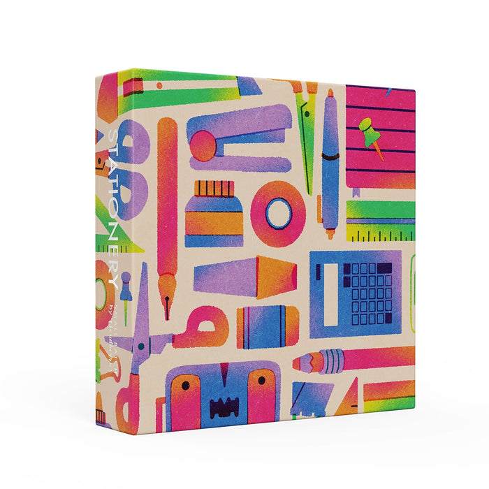 The Cloudberries Stationery 1,000 Piece Jigsaw Puzzle features vibrant illustrations of pens, scissors, a calculator, ruler, push pin, and tape—ideal for desk lovers or stationery puzzle enthusiasts.