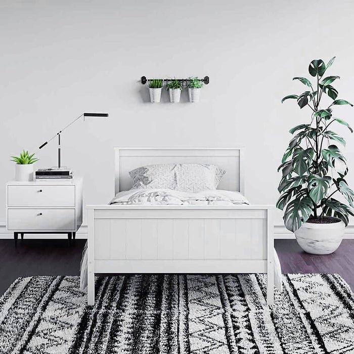 Tertia Solid Pine Timber Bed Frame King Single, showcasing solid construction with engineered wooden slats. Featured in a stylish, modern bedroom setting, emphasizing its robust design and suitability for restful sleep.