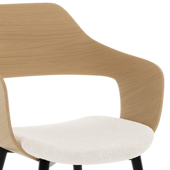 Winfield Curved Wooden Back Boucle Dining Chair Cream White Set of 2 features a close-up view of the chair's armrest and wooden back, highlighting its elegant design and craftsmanship.